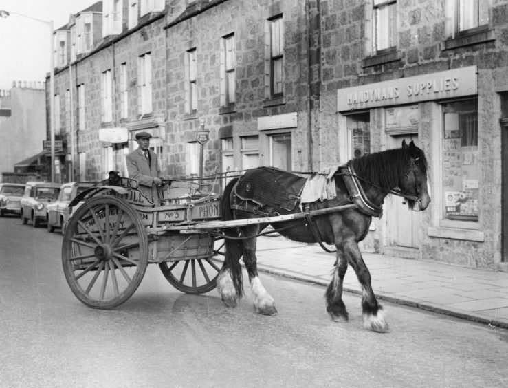 1967: Milkman Hugh Will of Smithfield Farm Dairy seen here on Great Northern Road during his round in February 1967. This cart was one of the last Aberdeen milk carts photographed in Woodside.
