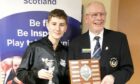 Daniel Tibbets (ASV Table Tennis Academy) with his u13 boys' Scottish title, alongside Table Tennis Scotland president Stewart McGowan