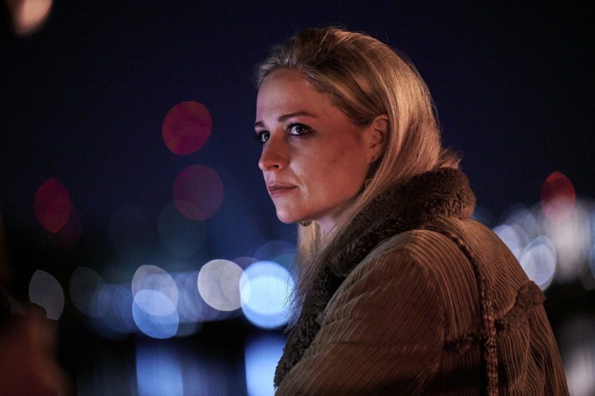 A scene from deceit showing actress Niamh Algar portraying undercover police officer Lizzie James.