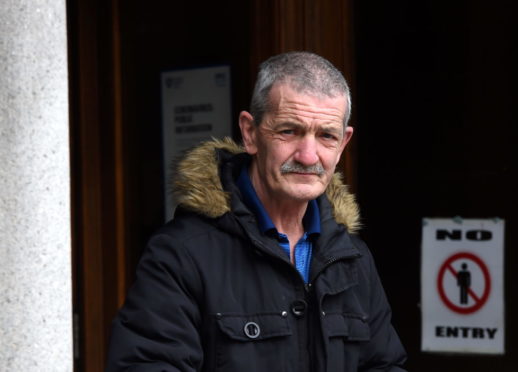 Neil McGillivray leaving court.