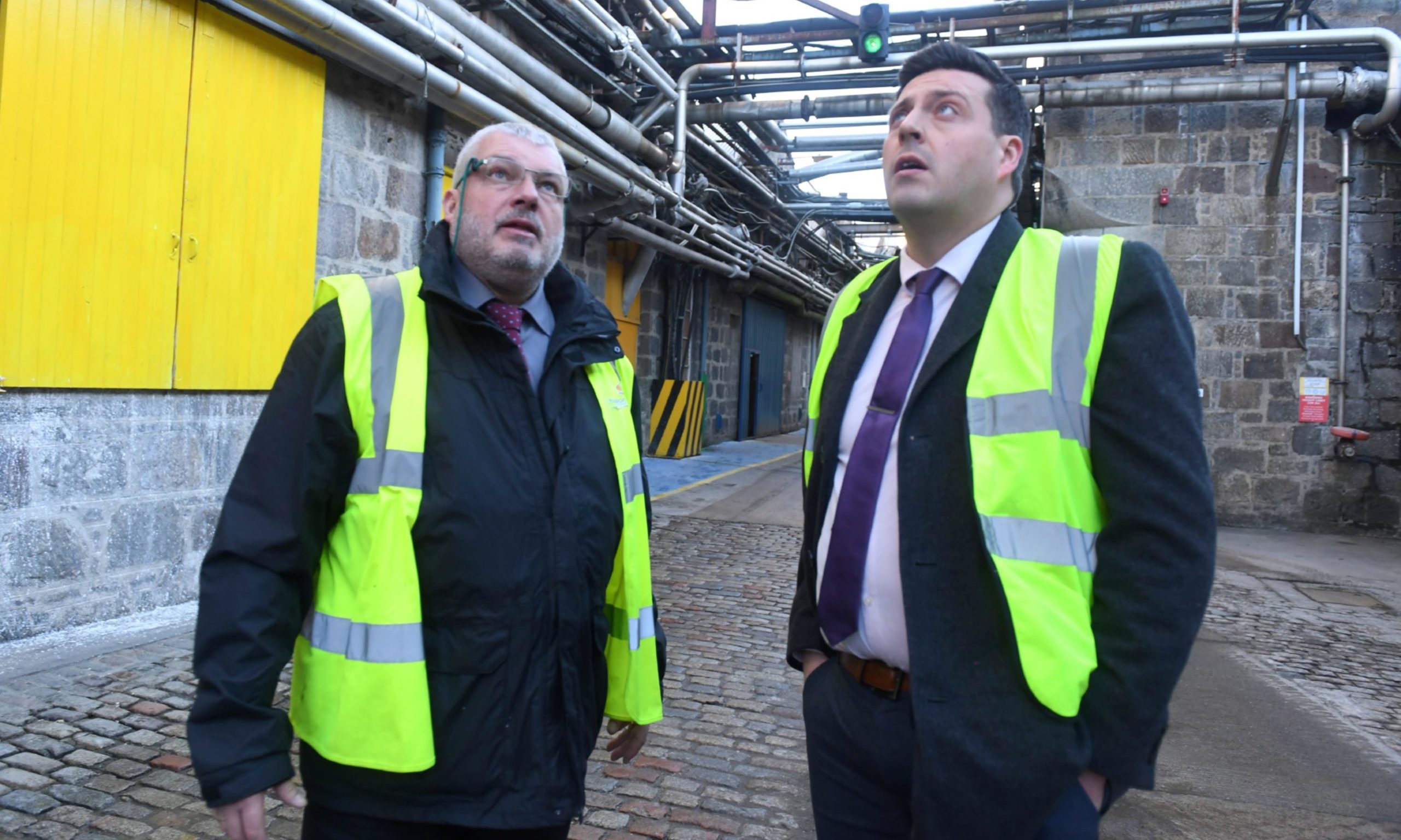 Business Minister Jamie Hepburn and Angus MacSween, right on a visit to Stoneywood paper mill in January 2019.