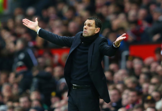 NEW BOY:  Gus Poyet is guiding his charges in La Liga.