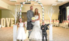 My quine Caroline with her husband Ritchie and children Callie and Jamie. Picture by LoveWeddings
