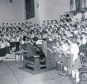 1979: An organist leading massed choirs at the 1979 carol concert show