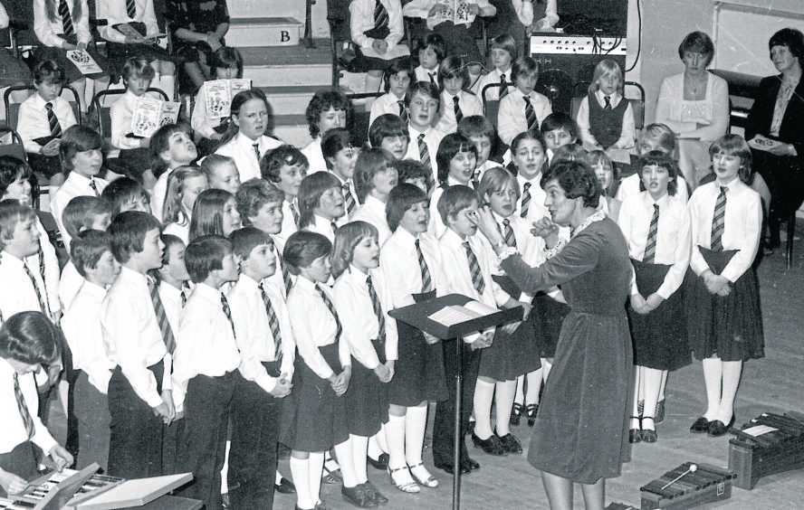 1981: Faces full of concentration during the carol concert at Aberdeen Music Hall