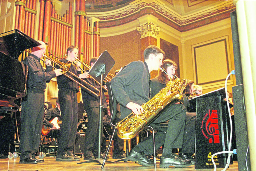 1999: Brass musicians adding their particular skills and gusto to the entertainment