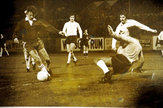 Division One. Season 1972-73. Aberdeen 3  Dundee 1. Zoltan Varga waltzes round the Dundee keeper to score Aberdeen's second goal.