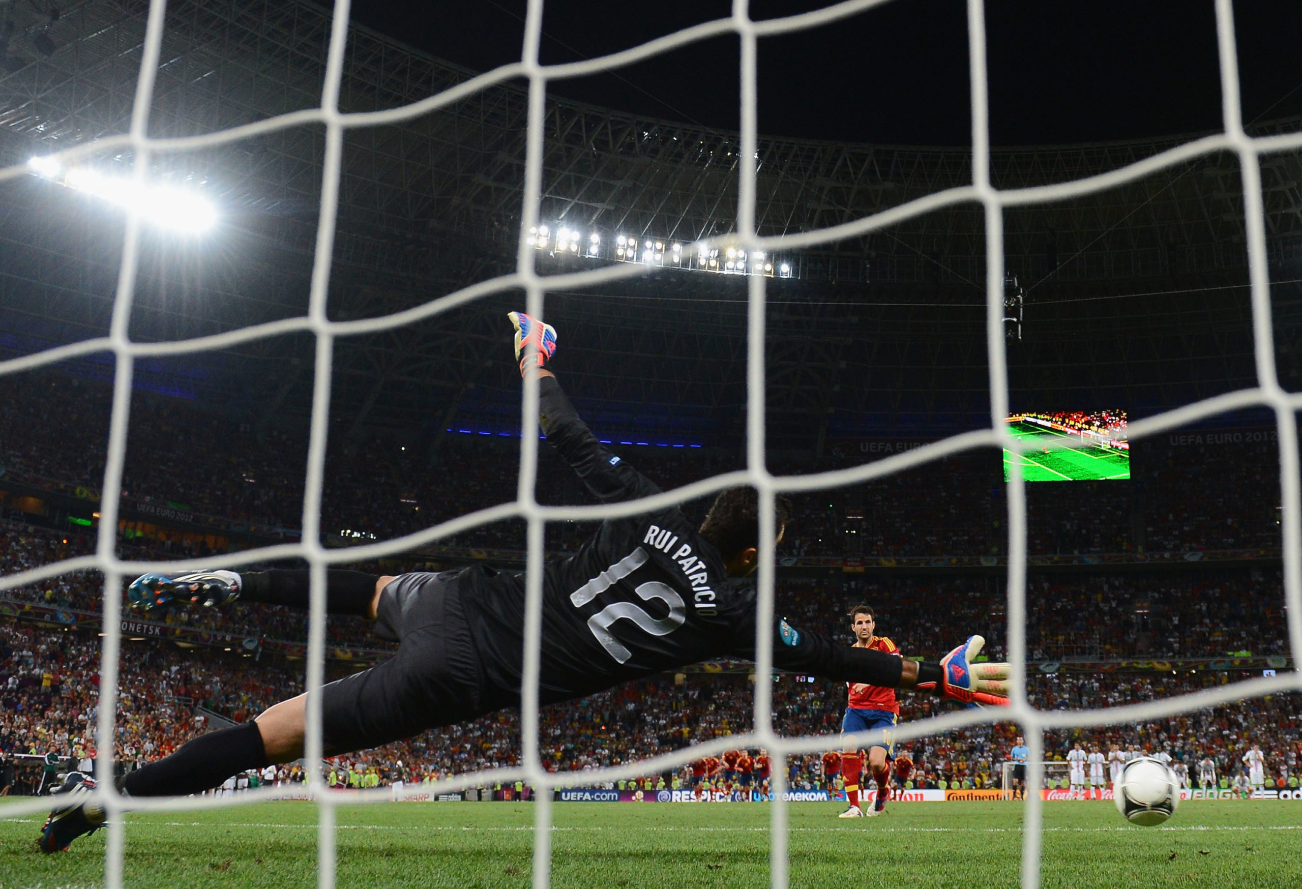 Cesc Fabregas scores the winning penalty