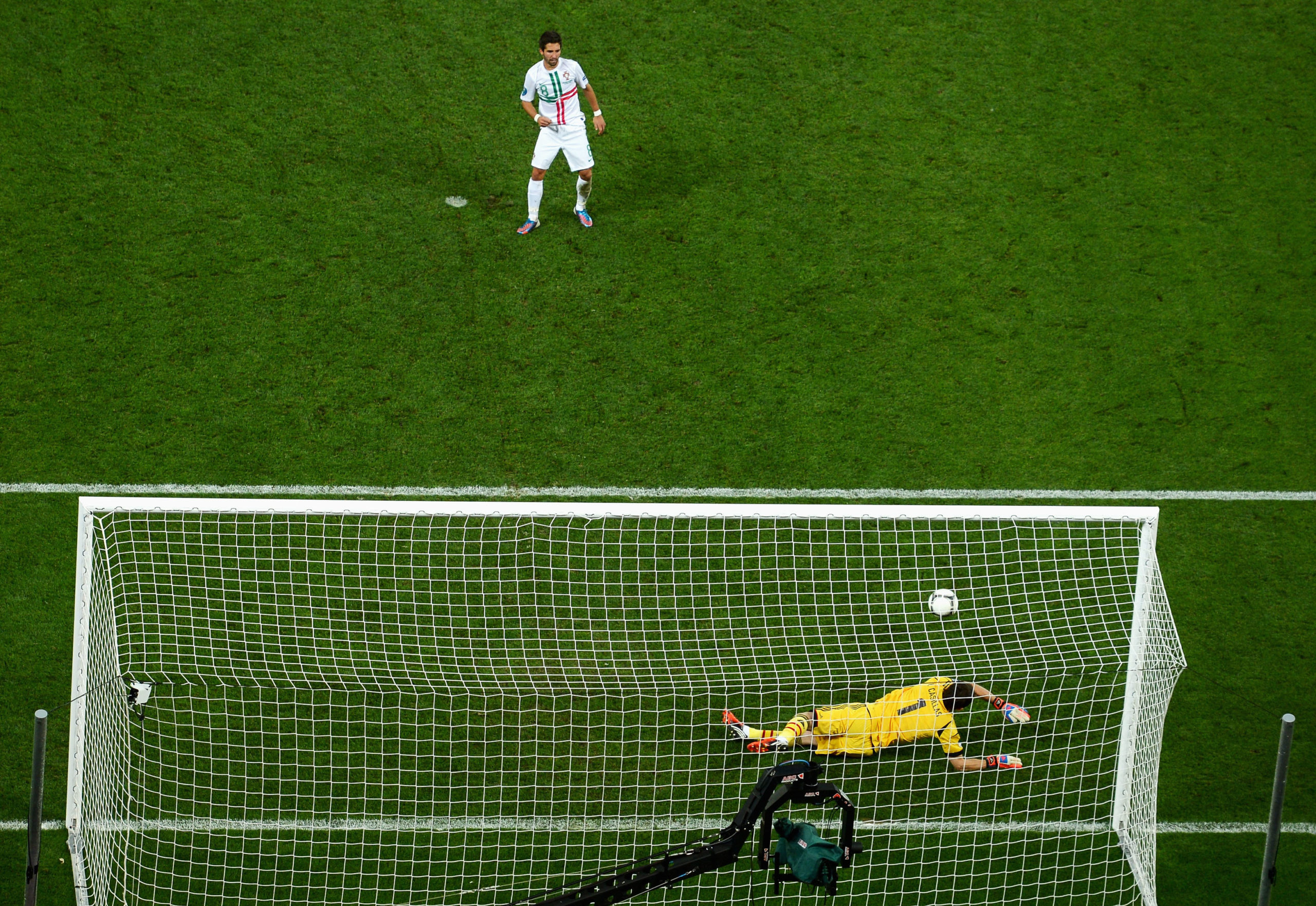 Iker Casillas saves a penalty from Joao Moutinho