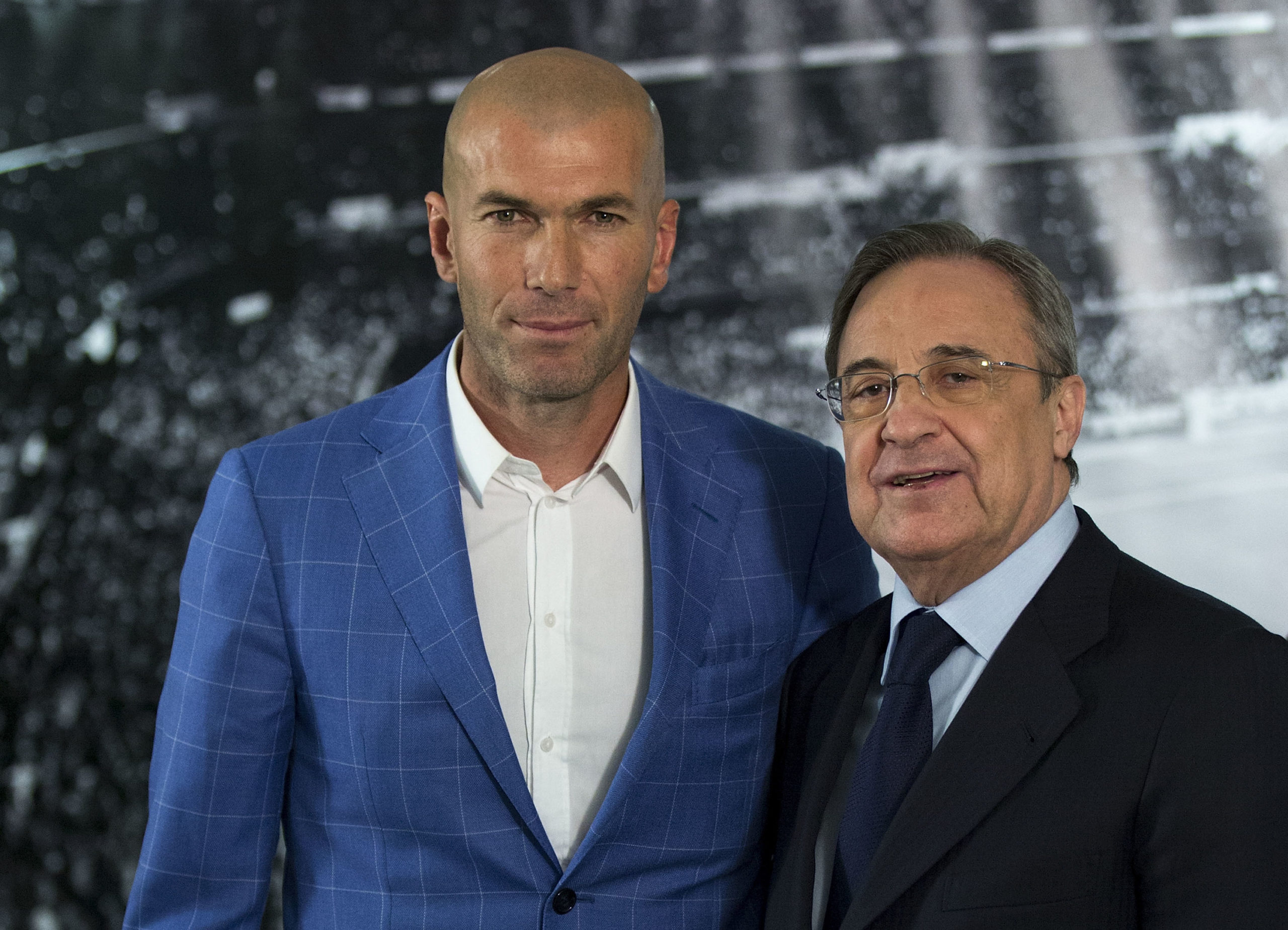 Real Madrid CF president Florentino Perez poses for a picture with Zinedine Zidane.