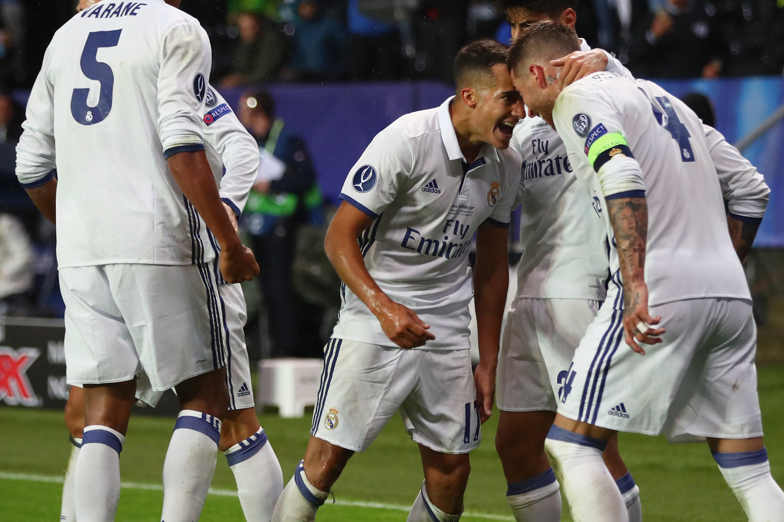 Lucas Vazquez of Real Madrid celebrates with goalscorer Sergio Ramos  after the second equalising goal during the UEFA Super Cup match between Real Madrid and Sevilla.