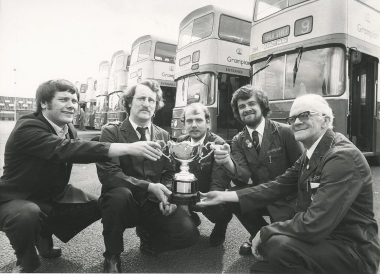 1982: Grampian Regional Transport First Aid team proudly show off the Braithwaite Trophy they drove off with for gaining the highest individual marks in the National Road Passenger Transport Association (Northern Area) competition which was held at Lothian Region Transport's central garage in Edinburgh. The team who were placed third overall are (left to right) Mr Fred Thouless, Mr Sandy Fleming, Mr David Goymer, Mr John Thomson and Mr Jack Thomson, all Aberdeen.