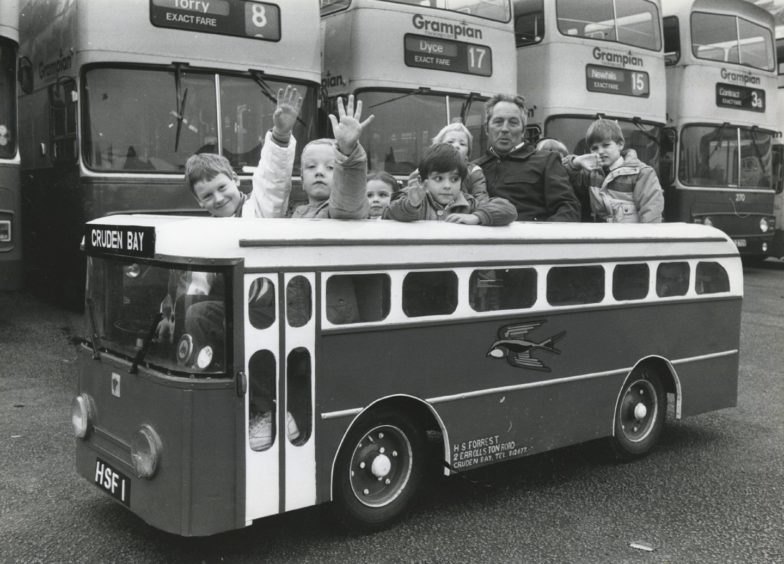 1987: At the wheel of the children's fun bus was Harry Forrest, Cruden Bay.
