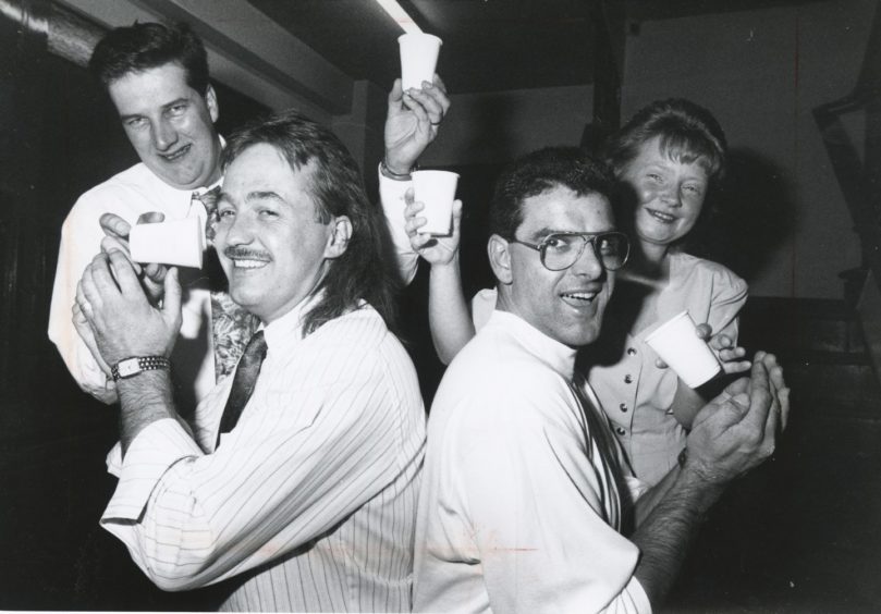 1991: Ready for a drink are Grampian Transport drivers Alan Killin (left) and Neil Warden, after raising £260 in the Evening Express Half Marathon for cerebal palsy sufferer, Scott Cameron (5), Marchburn Court, Northfield, Aberdeen. Scott's parents Brian and Denise, were at a charity night raised £1,145.99. The cash will buy a walking frame for Scott.