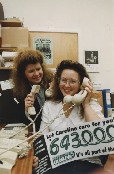 1991: Grampian Transport careline officer Lynn Anderson (right) mans the new phoneline, watched by marketing officer Shona Byrne.