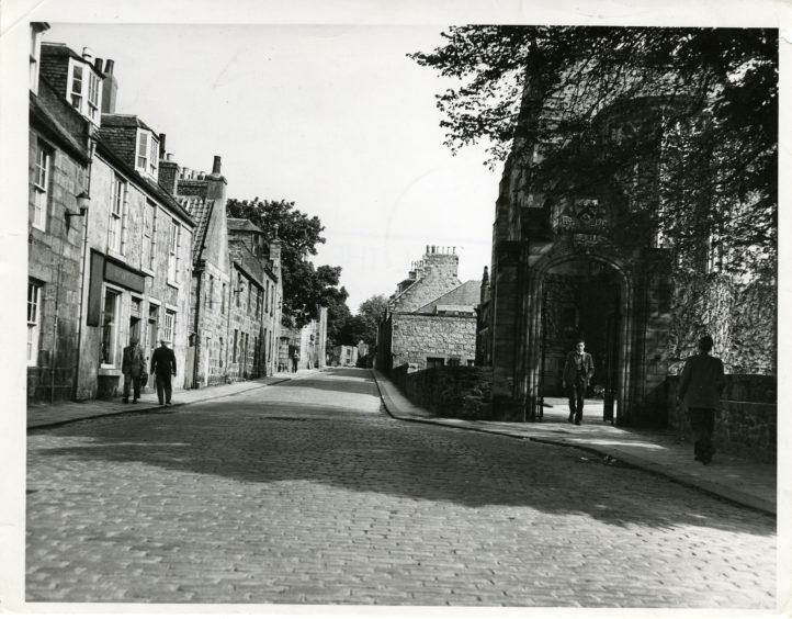 1958: The High Street, Old Aberdeen, Aberdeen.  On the right is one of the ornamented entrances to King's College.