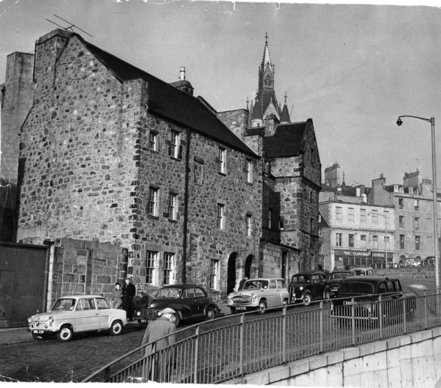 Provost Ross's House in Shiprow, Aberdeen. Behind is the spire of the Town House Tower.