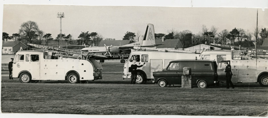1973: Emergency services awaiting the arrival of the plane at Aberdeen Airport.