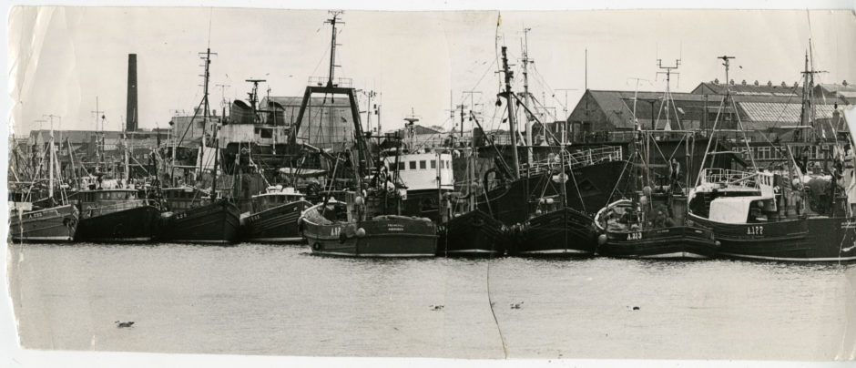 1975: Inshore fishing boats from the North East and Moray Firth harbour take up their positions in Aberdeen Harbour.