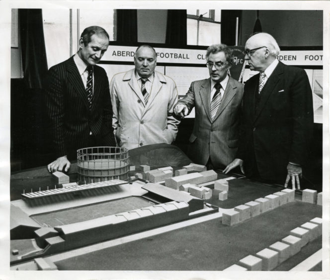 1980: Aberdeen vice chairman Chris Anderson, left builder Mr Peter Cameron, Mr A. Bremner (of A. Farquhar the builders) and Don's chairman Dick Donald examine the model of the Pittodrie club's new stand.