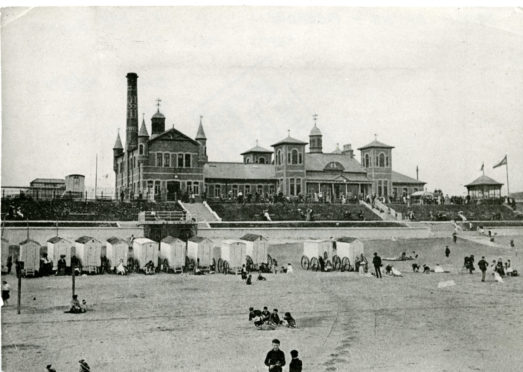 The Beach Baths at Aberdeen seafront.  Bathing huts can be seen on the beach.