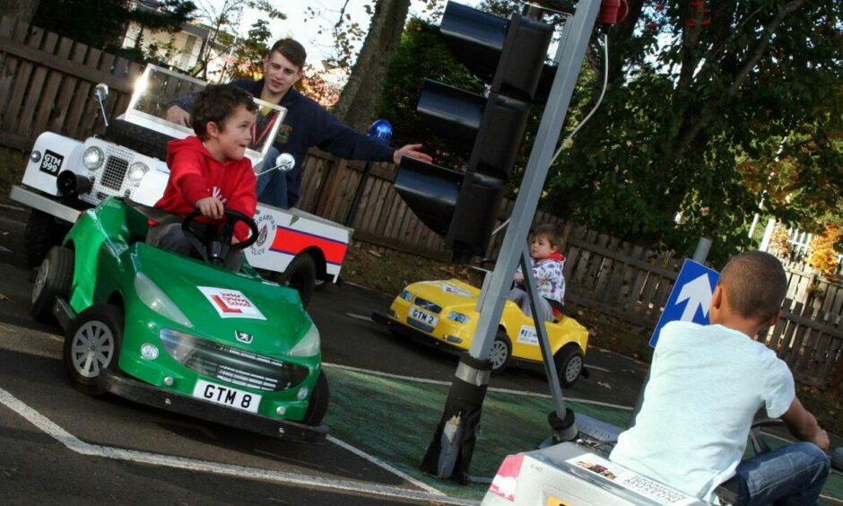 Kids learning how to drive at Grampian Transport Museum's junior driving school