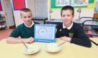 Aberdeenshire pupils Angus Beverly, left, and William Dibb helped launch a successful petition to get puddings back on primary school menus. Photo by Michael Traill