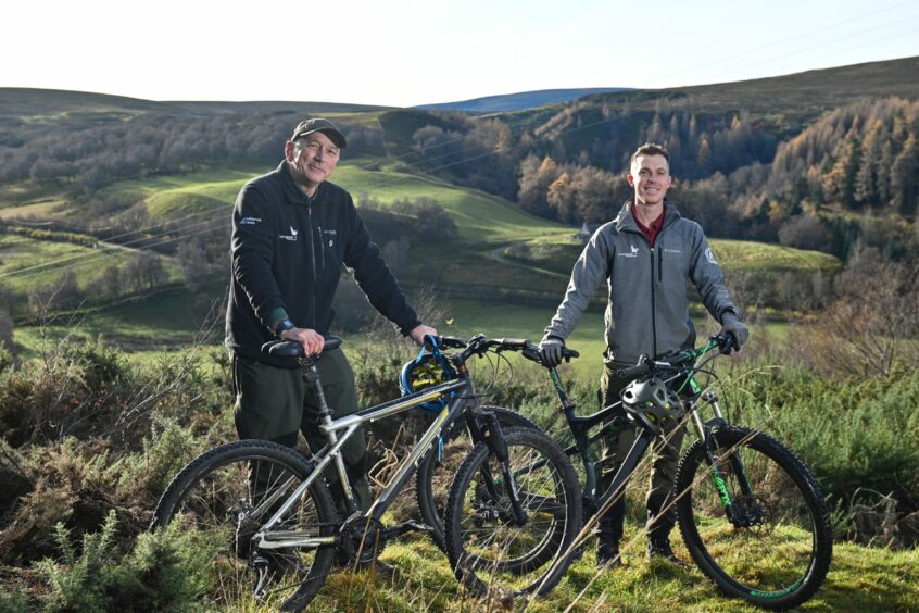 Pete with one of his colleagues at the Cairngorm National Park after recovering from viral encephalitis.