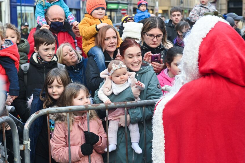 Mum Kirsteen Foster and baby Remie meet Santa. Pictures by JASON HEDGES