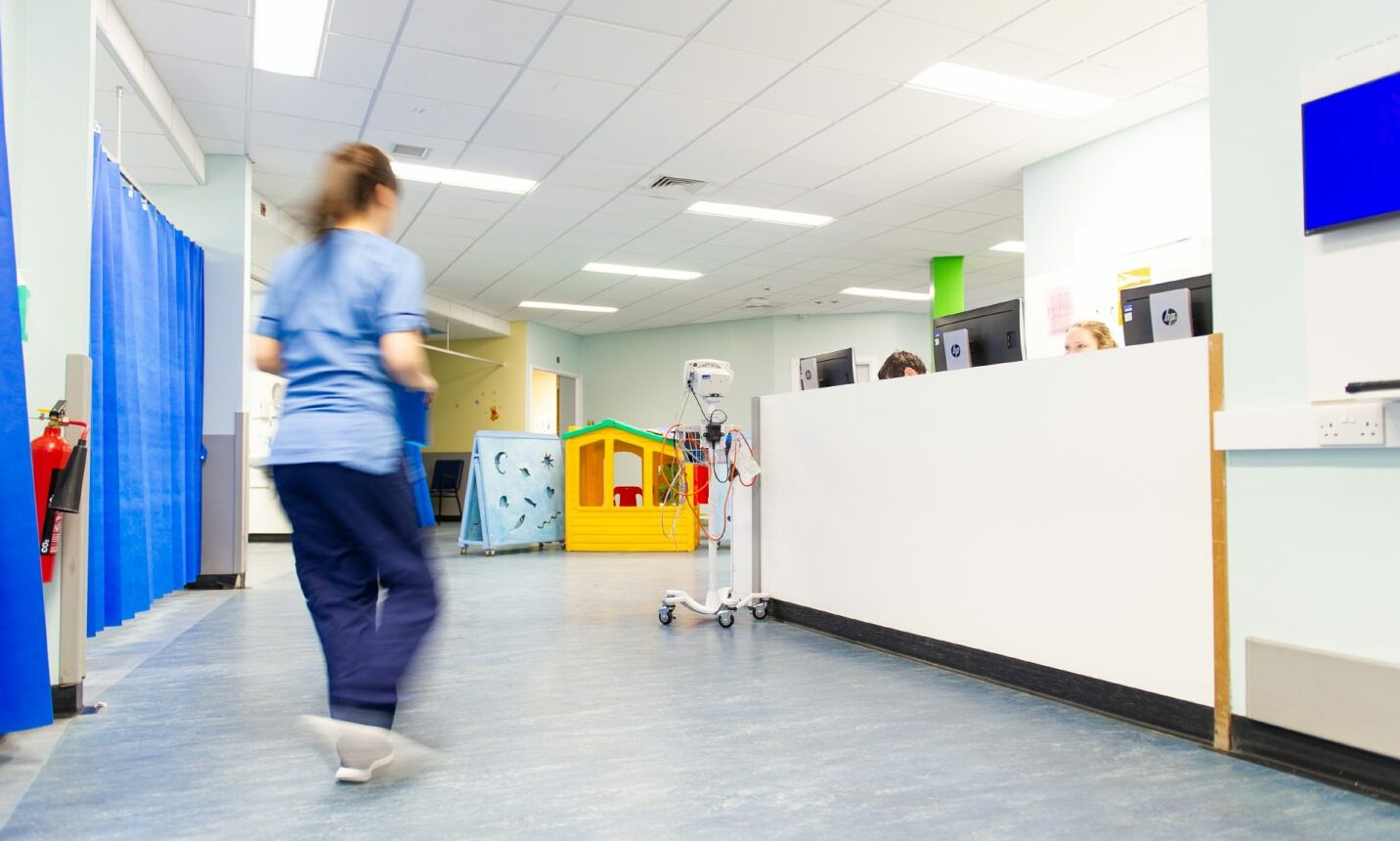 Hospital worker in a Ninewells Hospital corridor