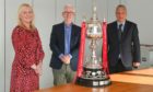 (L-R) Elaine Farquharson-Black, Frank Gilfeather and Willie Young draw the ties for the 2021/22 Aberdeenshire Cup. Picture by Kenny Elrick
