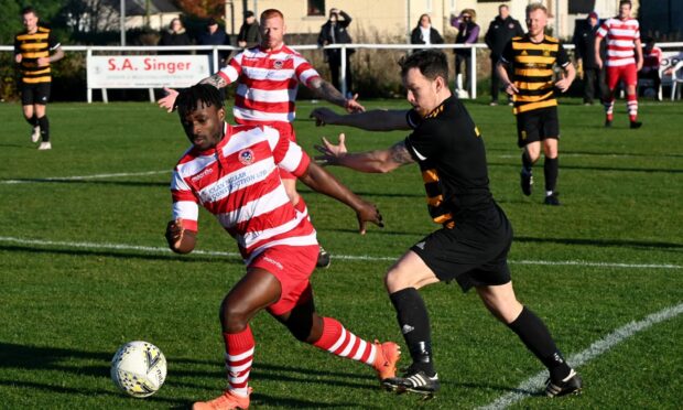 Stoneywood's Barin Faleye, left, and Alan Lloyd, right, of Stonehaven. Picture by Kenny Elrick