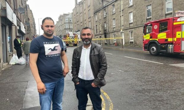 Talwinder Singh and Irfan Bashir from Aberdeen helped people escape the blaze in Albert Street.