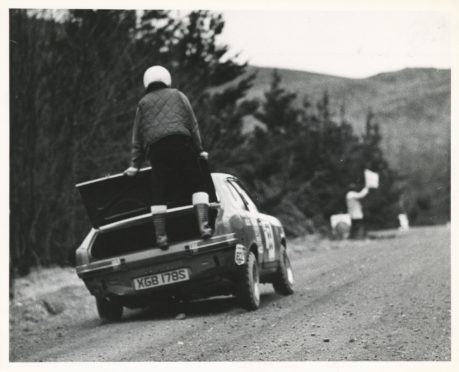 Skene driver Keith Morrison lost a front wheel from his Talbot Avenger and navigator Andrew Hosie rode shotgun at the back of the car in a bid to keep the front clear of the ground