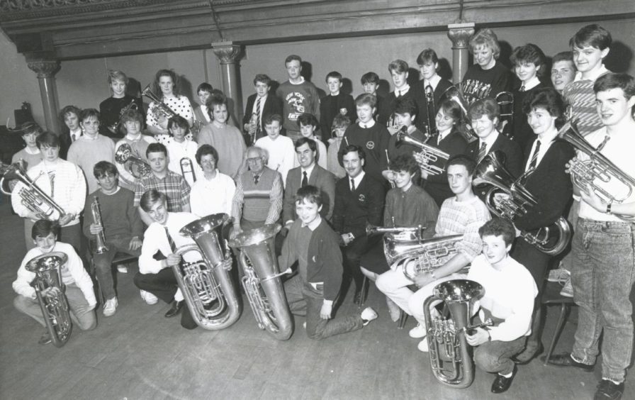 1987: Members of Aberdeen Music Centre Senior Brass Band who leave on June 8 for a ten day visit to Denmark in an exchange visit with the Music Centre in Skjern, West Jutland. The band will play in five concerts which will include playing for the mayor of Skjern, where they will be staying, Legoland and Stauning Airport which is holding a vintage aircraft exhibition. In the party are James Anderson, adviser in music, Stewart Watson, conductor, Moira Ross and Eric Kidd (brass instructors) and 36 band members. This is the first time the brass band has played abroad and is the first leg of the exchange with the musicians in Skjern who will be here next summer possibly during the Bon-Accord Festival.