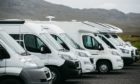 Campervans lined up at Durness on the NC500. Photo: Andrew Cawley