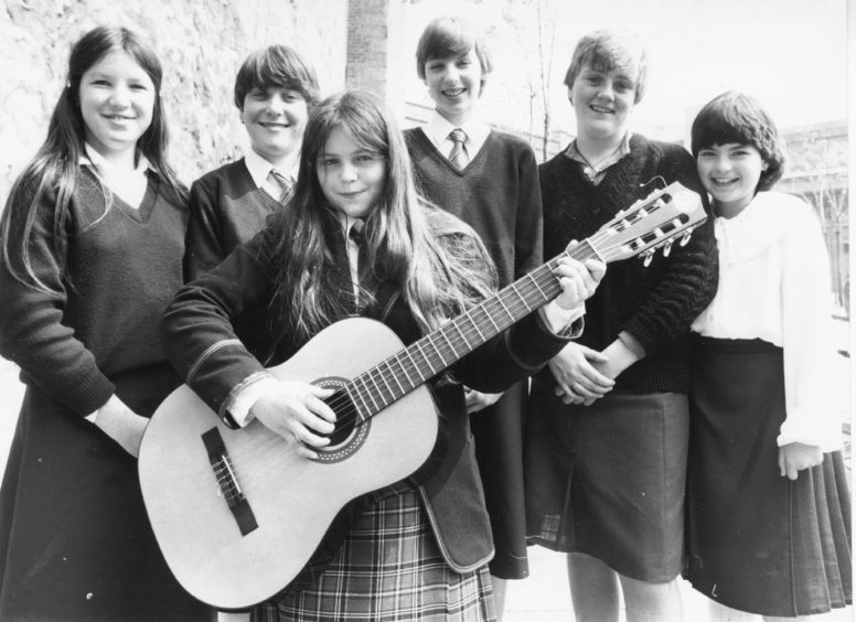 1982: Winner of the guitar competition for 14 years and under, Suzanne Morrow (centre) Westhill, is joined by fellow competitors (left to right) Ronay Thomson, Karen Taylor, Lesley Mitchel, Julie Tosh and Yvonne McLaren, all Aberdeen.