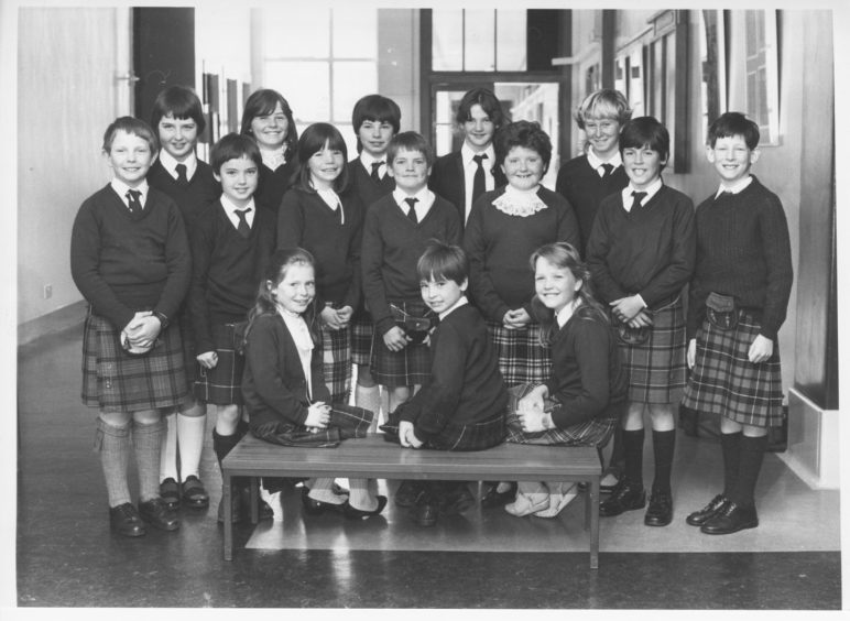1986: Looking a picture in their Highland dress are members of the Crathie Primary School Choir who came second in the Primary Scots song event in Powis Academy.