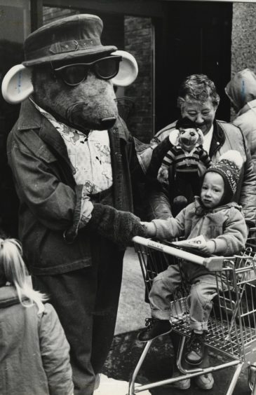 1986 - Little Lee Carle of Dyce met ‘Roland Rat’ when the TV character opened the Co-op’s revamped superstore