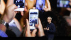Apple CEO Tim Cook launches the iPhone 7 (AP)