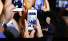 Apple CEO Tim Cook launches the iPhone 7 (AP)