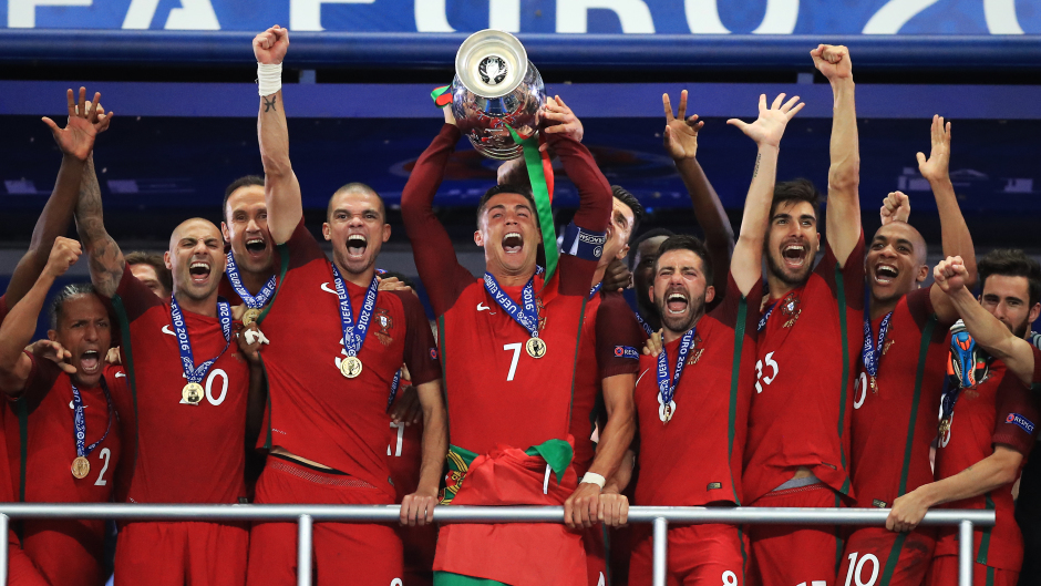 Cristiano Ronaldo lifts the trophy following Portugal's 1-0 win over France in the final