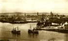 1930s postcard showing the meeting point of the River Dee channel and the Tidal Harbour with Pocra Quay on the right. Steam trawler Victoria Regina (A590) heads out to sea, while Crisabelle Stephen (A374) returns to harbour.