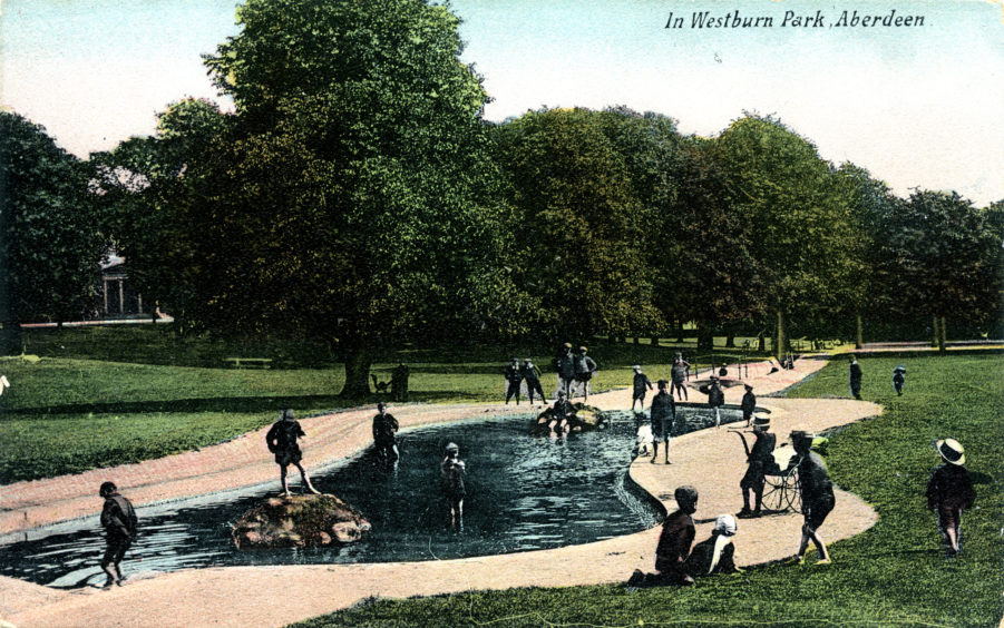 A central feature of the park was the large pond designed for curling and skating, as shown in this wintry scene from around 1902.