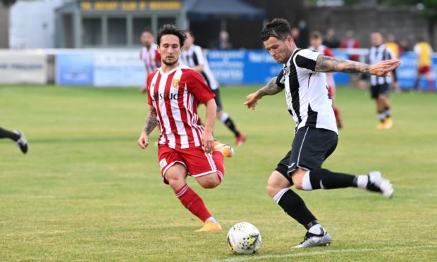 Fraserburgh's Ryan Cowie, right, looks to get away from Formartine's Andrew Greig