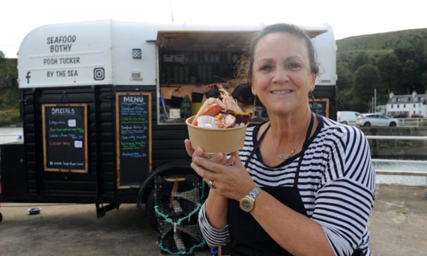 Maria Lewis, owner at Seafood Bothy, in front of the eatery van.