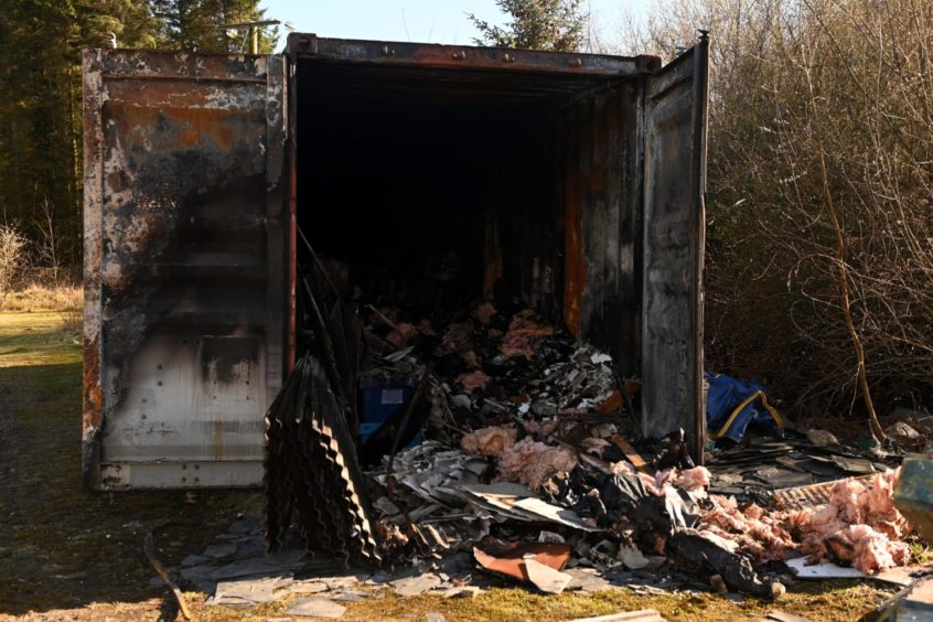 Damage at Somebody Cares container in Hazelhead. which was set on fire.