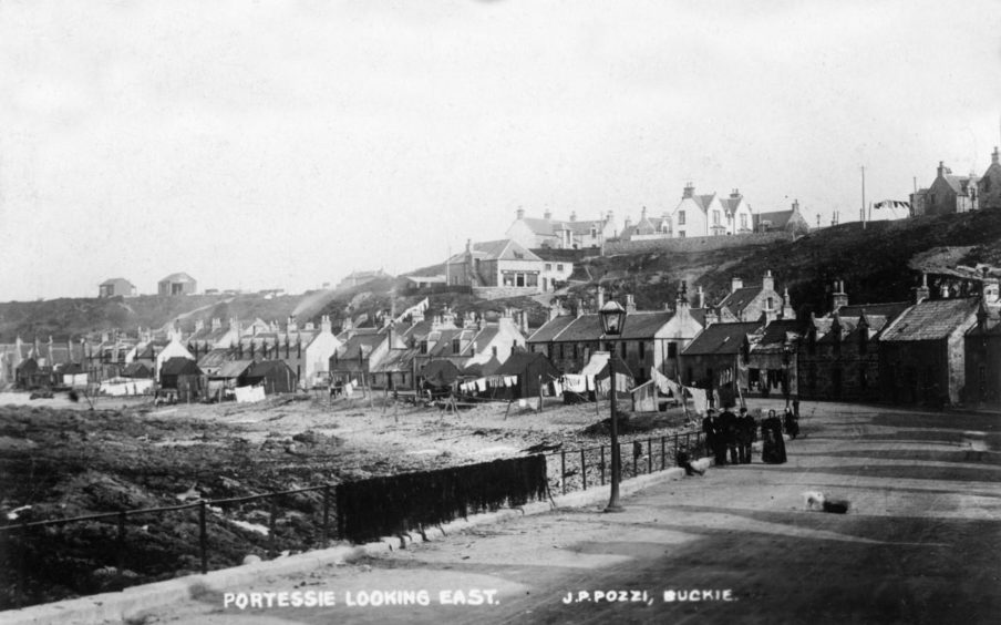 The view of the harbour from a street in Portessie.