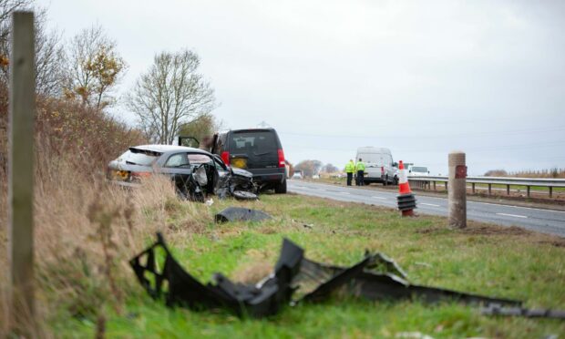 Police at the scene of the accident at North Water Bridge on the A90. Photo: Paul Smith