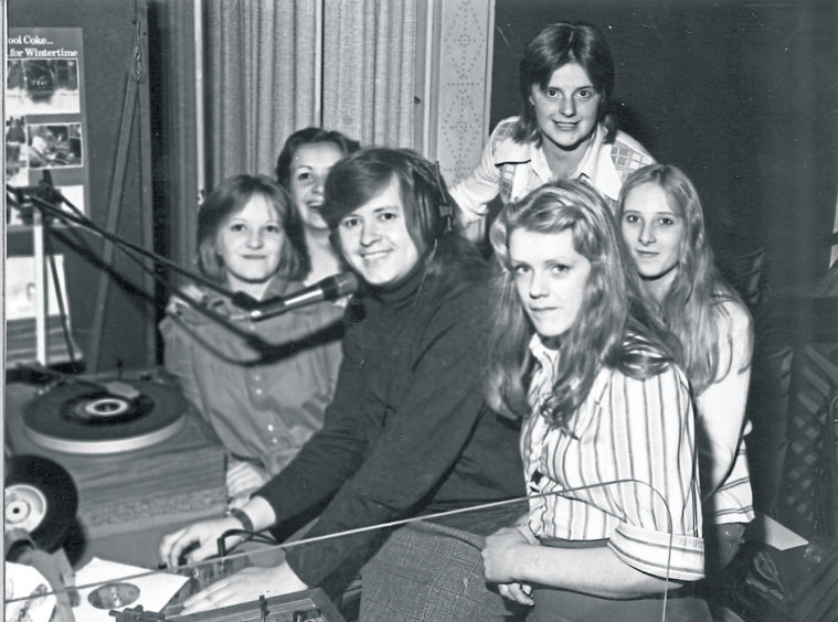 1974: Disc jockey Dave Fraser and some dance-goers at the Palace Ballroom, Aberdeen, in 1974.